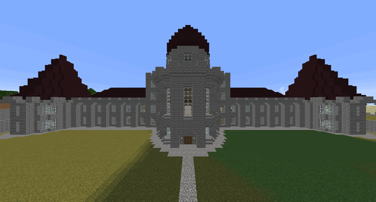 minecraft building made of stone brick with a nether brick roof, there are two low towers on each end and a larger tower in the middle, in front is a big lawn with a small bridged moat and a stone brick and iron bar fence, the image is animated so that the middle of the building bounces between being close and far away
